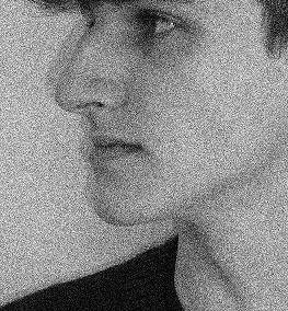 Photoshopped image of a face in a grainy black and white.